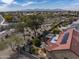 A backyard features desert landscaping with a patio, garden, and desert views at 18400 N Deer Grass Ct, Surprise, AZ 85374
