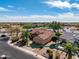 Well-maintained home with desert landscaping, a red tile roof and an attached two-car garage at 18400 N Deer Grass Ct, Surprise, AZ 85374