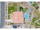 Bird's eye view of a backyard featuring a pool, putting green, landscaped yard, and covered patio at 20618 W Western Dr, Buckeye, AZ 85396