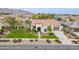 Attractive single-Gathering home with green lawn, desert landscaping, and tile roof, showcasing curb appeal at 20618 W Western Dr, Buckeye, AZ 85396