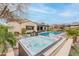 Inviting hot tub surrounded by pavers and lush landscaping at 20618 W Western Dr, Buckeye, AZ 85396