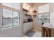 Bright kitchenette with modern appliances, shelving, and ample natural light at 20618 W Western Dr, Buckeye, AZ 85396