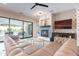 Open-concept living space seamlessly connects to the outdoor pool area through large sliding glass doors at 20618 W Western Dr, Buckeye, AZ 85396