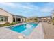 Beautiful pool with a paver deck and landscaped backyard perfect for entertaining at 20618 W Western Dr, Buckeye, AZ 85396