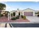 Charming single-story home with manicured landscaping and a two-car garage at 22416 N Arrellaga Dr, Sun City West, AZ 85375