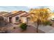 A well-maintained home featuring desert landscaping and a two-car garage at 22756 W Papago St, Buckeye, AZ 85326