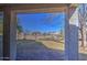 Enjoy the shaded backyard with a view, perfect for outdoor relaxation and entertaining at 2325 S 88Th Dr, Tolleson, AZ 85353