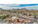 A lovely community is nestled against a backdrop of majestic mountains and blue skies at 2365 E Shea Blvd, Phoenix, AZ 85028