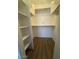 Walk-in closet with shelves and hanging rods at 2625 E Indian School Rd # 335, Phoenix, AZ 85016