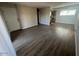 Large living room area with a view into the kitchen with stainless steel appliances at 2625 E Indian School Rd # 335, Phoenix, AZ 85016