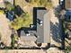 Birds eye view of a grey roof, well-maintained landscaping, and inviting backyard at 2718 E Campo Bello Dr, Phoenix, AZ 85032