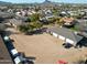 An elevated view of the property reveals a truck and garage, nestled within a serene neighborhood at 2718 E Campo Bello Dr, Phoenix, AZ 85032