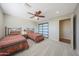 Shared bedroom featuring twin beds, ceiling fan, recessed lighting, and a sliding closet door at 2718 E Campo Bello Dr, Phoenix, AZ 85032