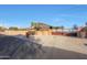Long driveway that leads to a gated home on a large lot with mature landscaping and desert flora at 2718 E Campo Bello Dr, Phoenix, AZ 85032
