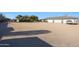 Detached garage with large gravel parking area at 2718 E Campo Bello Dr, Phoenix, AZ 85032