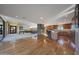 Open-concept home with a fireplace, gourmet kitchen, hardwood floors, and an inviting atmosphere for gatherings at 2718 E Campo Bello Dr, Phoenix, AZ 85032