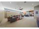 Bright and airy living area with a large seating area and an open layout, perfect for entertaining at 2718 E Campo Bello Dr, Phoenix, AZ 85032