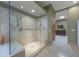 Luxurious main bathroom featuring a glass enclosed shower and access to a walk-in closet at 2718 E Campo Bello Dr, Phoenix, AZ 85032