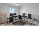 Bedroom featuring a ceiling fan, carpet, and 2 desk setups by the window at 2955 N Brighton --, Mesa, AZ 85207