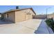 Wide-open backyard with concrete patio and block wall fencing at 3632 W Kelton Ln, Phoenix, AZ 85053