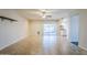 Open-concept dining area with sliding glass doors and neutral tile flooring at 3632 W Kelton Ln, Phoenix, AZ 85053
