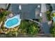 Stunning aerial view of a private backyard oasis with a sparkling pool, lush landscaping, and ample patio space at 3640 E Fairmount Ave, Phoenix, AZ 85018