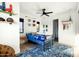 Bright bedroom with a bed, hardwood floors, natural light, and playful decor at 3640 E Fairmount Ave, Phoenix, AZ 85018
