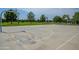Well-maintained outdoor basketball court surrounded by trees, offering a great recreational space at 4064 E Morrison Ranch Pkwy, Gilbert, AZ 85296