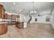 Open-concept kitchen with a large island, and stainless steel appliances at 4064 E Morrison Ranch Pkwy, Gilbert, AZ 85296