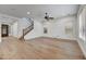 Spacious living room with wood floors and abundant natural light at 4064 E Morrison Ranch Pkwy, Gilbert, AZ 85296