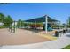 Fun playground featuring slides, swings, and climbing structures for children to enjoy in a shaded area at 4064 E Morrison Ranch Pkwy, Gilbert, AZ 85296