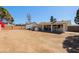 Expansive backyard with a covered patio, perfect for outdoor entertaining and relaxation at 414 W Piute Ave, Phoenix, AZ 85027