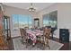 Well lit dining area offers ample space for gatherings, complimented by large windows at 4182 N Potomac Dr, Florence, AZ 85132