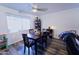 Cozy dining area with natural light, modern flooring, and stylish table setting at 5458 W El Caminito Dr, Glendale, AZ 85302