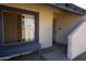 Exterior shot of a residential building with textured stucco and a blue accent wall at 5458 W El Caminito Dr, Glendale, AZ 85302