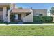 Charming home with desert landscaping, covered porch, and a red tile roof at 5458 W El Caminito Dr, Glendale, AZ 85302