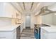 Modern kitchen featuring new appliances and white subway tile backsplash at 5458 W El Caminito Dr, Glendale, AZ 85302