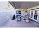 Cozy covered patio with comfortable seating, perfect for outdoor relaxation at 5458 W El Caminito Dr, Glendale, AZ 85302