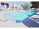 Community swimming pool with a cool, clean water and handrails at 5458 W El Caminito Dr, Glendale, AZ 85302