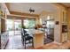 Bright kitchen featuring stainless steel appliances, granite countertops, and a seamless flow to the outdoor patio at 5824 N Scottsdale Rd, Paradise Valley, AZ 85253