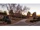 Elegant gated entrance with a waterfall feature and lush landscaping at 60 W Tonto Dr, Chandler, AZ 85248