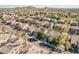 Expansive aerial view showcasing a well-planned suburban community with lush landscaping and scenic mountain backdrop at 6931 W Antelope Dr, Peoria, AZ 85383
