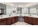 Primary bath featuring double sinks, generous counter space, and a large mirror at 6931 W Antelope Dr, Peoria, AZ 85383