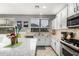 Eat-in kitchen featuring stainless steel appliances and ample countertop space at 6931 W Antelope Dr, Peoria, AZ 85383
