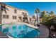 Sparkling pool surrounded by a spacious deck, offering a serene oasis for leisure and recreation at 6931 W Antelope Dr, Peoria, AZ 85383