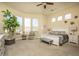 Bright and airy main bedroom featuring ample natural light and plush carpet at 7546 E Camino Puesta Del Sol --, Scottsdale, AZ 85266