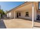 A covered patio area provides shelter from the sun with view of a fenced yard at 821 W Missouri Ave, Phoenix, AZ 85013