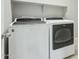Laundry room with a modern washer and dryer set at 8516 W Peppertree Ln, Glendale, AZ 85305