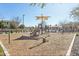 Community playground with slide and seating area at 8516 W Peppertree Ln, Glendale, AZ 85305