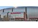 Architectural shot of State Farm Stadium with its sleek exterior, prominent signage, and modern design elements at 8516 W Peppertree Ln, Glendale, AZ 85305